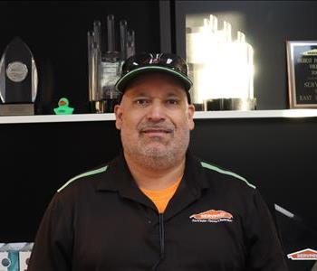 David Ortega, Mold Specialist at SERVPRO of Phoenix, wearing PPE while conducting a mold inspection at a residential property