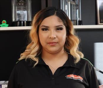 Professional headshot of Nina Macias, Event Specialist at SERVPRO of Phoenix, smiling in SERVPRO apparel