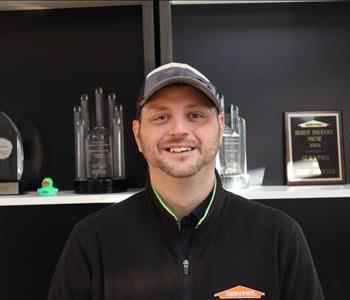 Professional headshot of Anthony Baird, Project Manager and Estimator at SERVPRO of Phoenix, in a SERVPRO-branded shirt